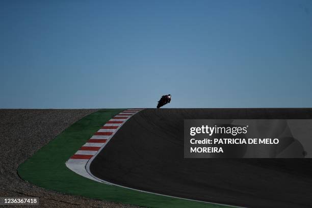 An unidentified rider rides during the second MotoGP free practice session of the Portuguese Grand Prix at the Algarve International Circuit in...