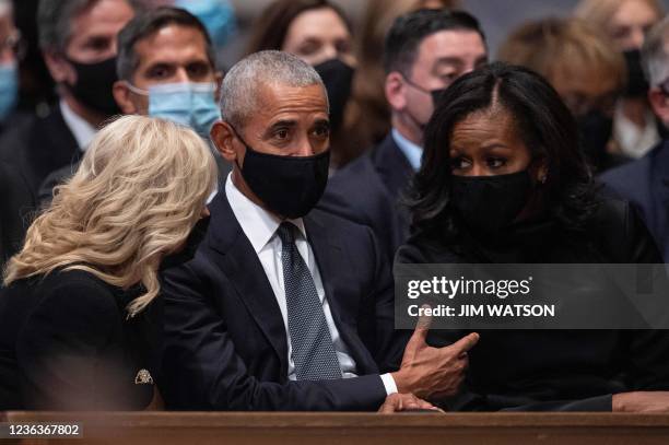 First Lady Dr. Jill Biden , former President Barack Obama and former First Lady Michelle Obama attend the funeral service of former Secretary of...