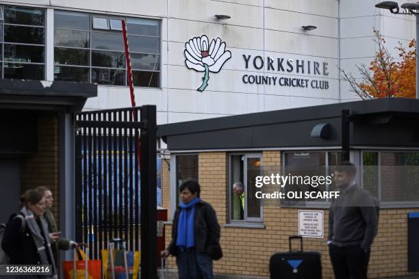People wait outside Headingley, the home of Yorkshire cricket on November 5, 2021. - Yorkshire were suspended from staging international matches...