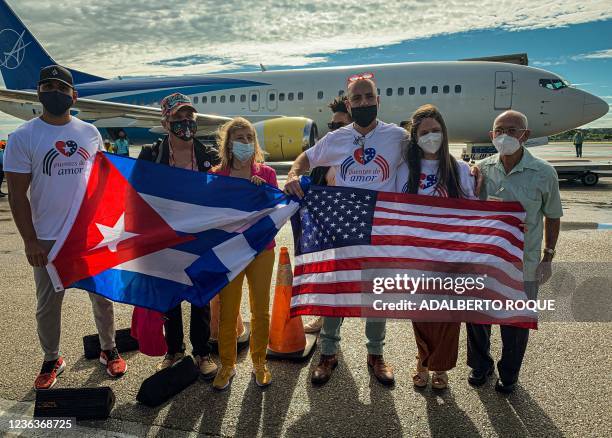 Members of the Puentes de Amor, The People's Forum and CODEPINK NGOs arrive with a cargo of humanitarian aid at Jose Marti international airport in...