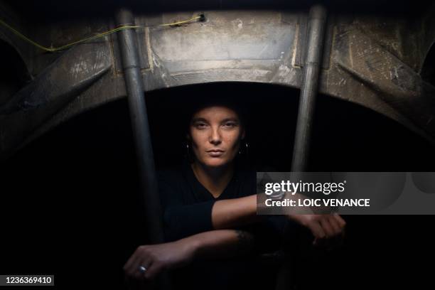 French skipper Marie Tabarly poses aboard the Imoca 60 monohull Kostum - Lantana Paysage which is mooring at the harbour of Le Havre, on November 5...