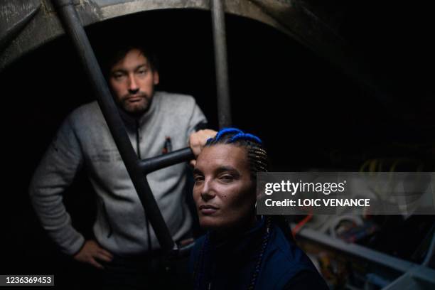 French skippers Marie Tabarly and Louis Duc pose aboard the Imoca 60 monohull Kostum - Lantana Paysage which is mooring at the harbour of Le Havre,...