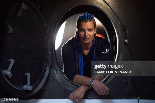 French skipper Marie Tabarly poses aboard the Imoca 60 monohull Kostum - Lantana Paysage which is mooring at the harbour of Le Havre, on November 5...