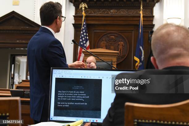 Text message from Kyle Rittenhouse to the Car Source used car lots offering to protect the businesses is shown on monitors to the witness and jury by...