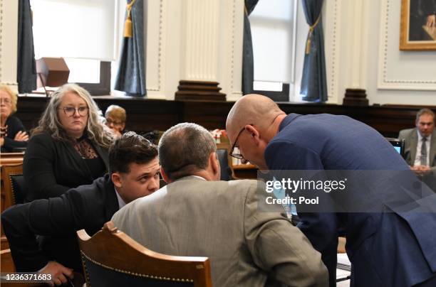 Listens to defense attorneys MARK RICHARDS and COREY CHIRAFISI in afternoon witness questioning of relatives of the owner of the Car Source used car...