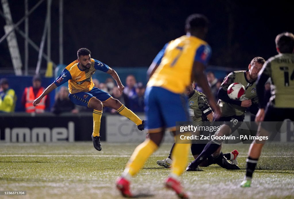 Marcel Lewis AFC Sudbury's Marley Andrews takes a shot on goal during the Emirates ...