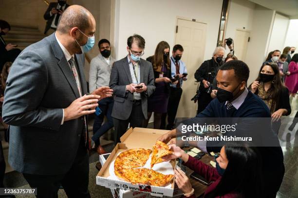 Congressional staffers grab a bite to eat while the Congressional Progressive Caucus meets on Friday, Nov. 5, 2021 in Washington, DC. After months of...