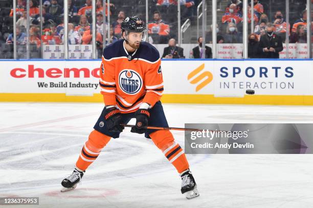 Brendan Perlini of the Edmonton Oilers warms up wearing Kevin Lowes number following the Jersey Retirement Ceremon prior to the game against the New...