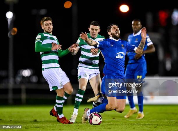 Waterford , Ireland - 5 November 2021; Anthony Wordsworth of Waterford in action against Dylan Watts, left, and Gary O'Neill of Shamrock Rovers...