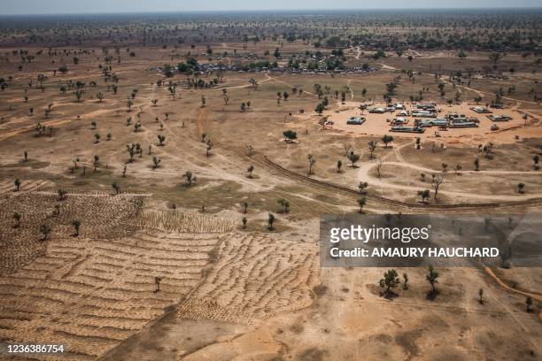 An aerial view shows the Temporary Operational Base of the United Nations Mission in Mali in Ogossagou village, Mopti region on November 5, 2021. -...