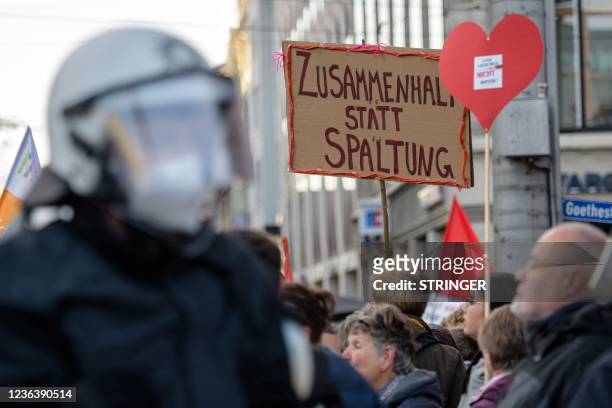 People take part in a demonstration of Germany's "Querdenker" movement that emerged as the loudest voice against the government's coronavirus curbs,...