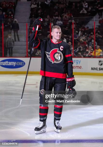 Wearing the C for the first time after being named the 10th captain in franchise history, Brady Tkachuk of the Ottawa Senators salutes the crowd...