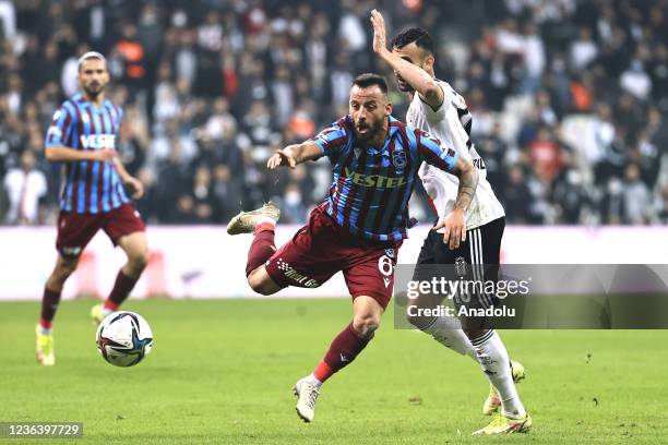 Manolis Siopis of Trabzonspor in action against Rachid Ghezzal of Besiktas during Turkish Super Lig week 12 soccer match between Besiktas and...