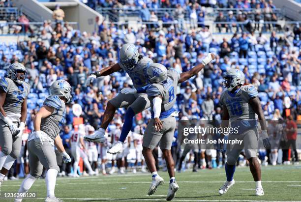 Russell and Xavier Cullens of the Memphis Tigers celebrate against the SMU Mustangs on November 6, 2021 at Liberty Bowl Memorial Stadium in Memphis,...