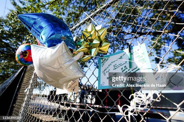 Letters and balloons are seen outside of the canceled Astroworld festival at NRG Park on November 6, 2021 in Houston, Texas. According to...