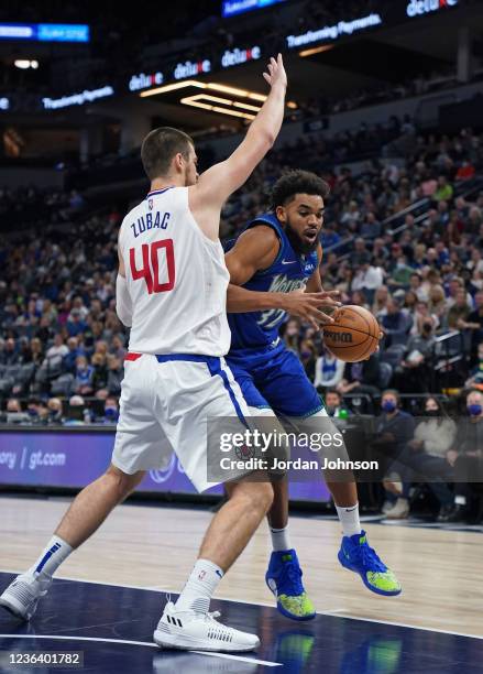 Karl-Anthony Towns of the Minnesota Timberwolves drives to the basket against the LA Clippers on November 5, 2021 at Target Center in Minneapolis,...