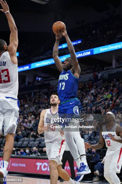 Taurean Prince of the Minnesota Timberwolves shoots the ball against the LA Clippers on November 5, 2021 at Target Center in Minneapolis, Minnesota....