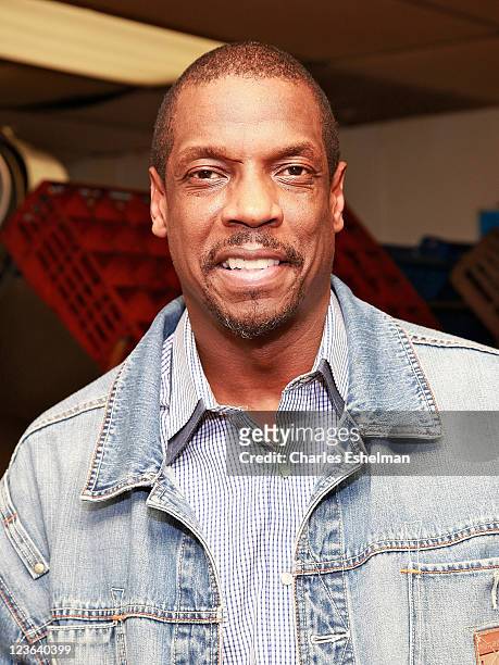 Dwight "Doc" Gooden, former Yankees and Mets baseball player, appears as a guest server at Sofrito on December 14, 2010 in New York City.