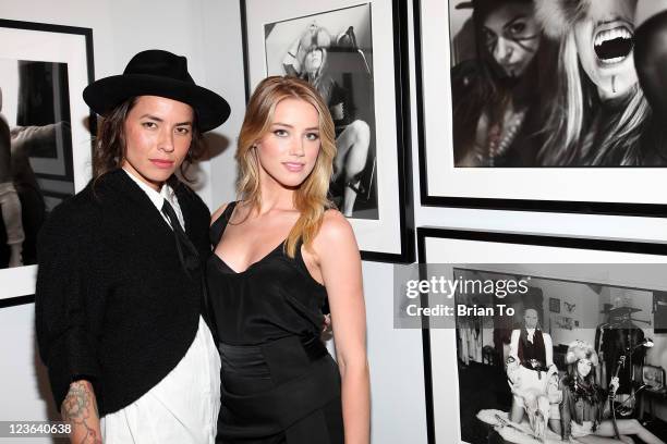 Artist Tasya van Ree and Amber Heard attend 2011 Los Angeles Comikaze Expo kick-off party at the Celebrity Vault on December 15, 2010 in Beverly...