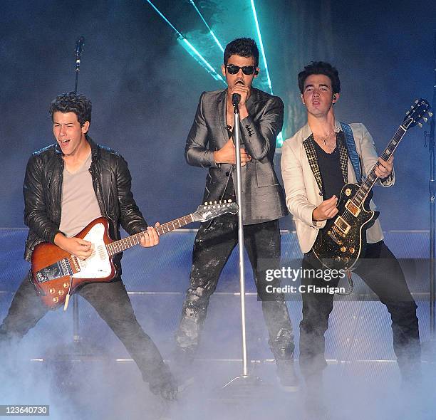 Musicians Nick Jonas, Joe Jonas and Kevin Jonas of The Jonas Brothers perform at Shoreline Amphitheatre on September 18, 2010 in Mountain View,...