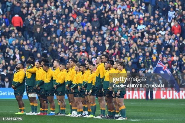 The Australia team line up for the anthems ahead of the Autumn International rugby union match between Scotland and Australia at Murrayfield Stadium...