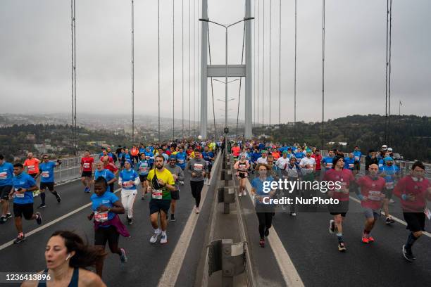 Runners seen on the July 15 Martyrs Bridge, formerly known as the Bosphorus Bridge, during the 43rd annual Istanbul Marathon in Istanbul, Turkey on...