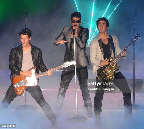 Musicians Nick Jonas, Joe Jonas and Kevin Jonas of The Jonas Brothers perform at Shoreline Amphitheatre on September 18, 2010 in Mountain View,...