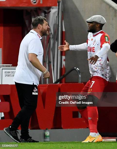 Head coach Steffen Baumgart of 1. FC Koeln and Anthony Modeste of 1. FC Koeln celebrates after scoring his teams second goal during the Bundesliga...