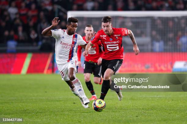 Baptiste Santamaria of Stade Rennais FC controls the ball against Thiago Mendes of Olympique Lyonnais during the Ligue 1 Uber Eats match between...