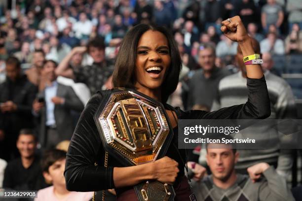 November 6: Candace Owens takes a moment to pose with a championship belt at Madison Square Garden for UFC268 - Usman vs Covington 2 - Event on...