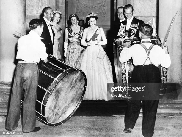 John Warden Brooke, 2nd Viscount Brookeborough , Queen Elizabeth II and her husband Prince Philip, Duke of Edinburgh listen to drummers, on July 3,...