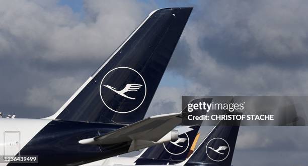 The logo of German airline Lufthansa is seen on airplanes standing on the apron at the "Franz-Josef-Strauss" airport in Munich, southern Germany, on...