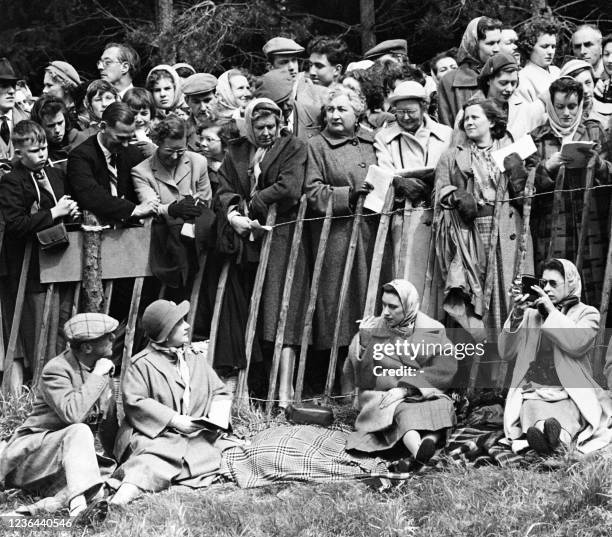 From left, Duke of Beaufort, Elizabeth, Queen mother, Princess Margaret and Queen Elizabeth II attend an horse race in Badminton on April 28, 1957.