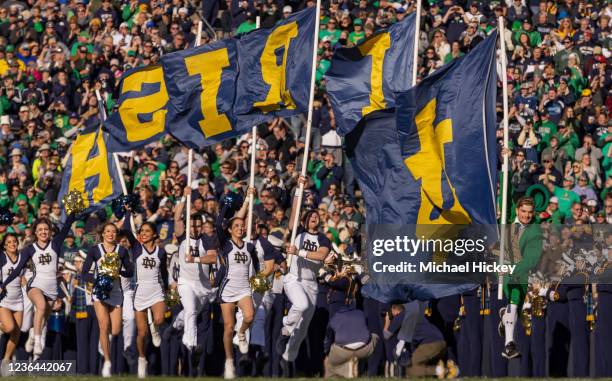 The Notre Dame Fighting Irish Leprechaun and cheerleaders are seen before the game against the Navy Midshipmen at Notre Dame Stadium on November 6,...