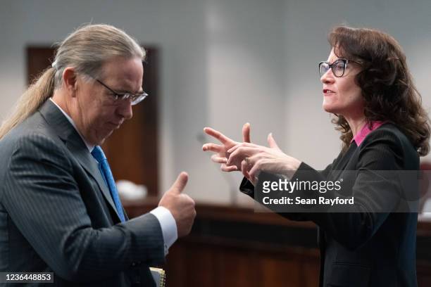 Prosecutor Linda Dunikoski and defense attorney Franklin Hogue communicate during the trial for Ahmaud Arberys shooting death at the Glynn County...