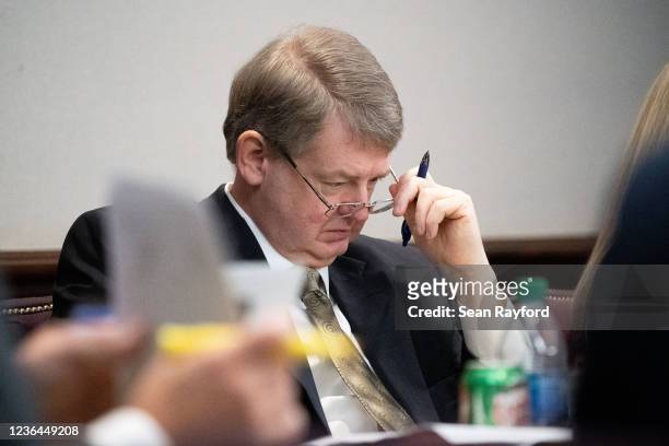 Defense attorney Kevin Gough looks a notes during the trial for Ahmaud Arberys shooting death at the Glynn County Courthouse on November 8, 2021 in...