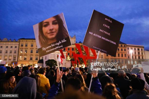 People attend 'Not one more! March for Iza' protest after 30-year-old woman, Iza, died of septic shock in her 22nd week of pregnancy being declined...