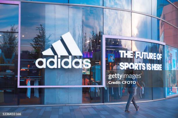 Photo taken on July 17, 2021 shows an adidas store in Shanghai, China. November 9, 2021 -- Sportswear brand Adidas is asking its employees to share...