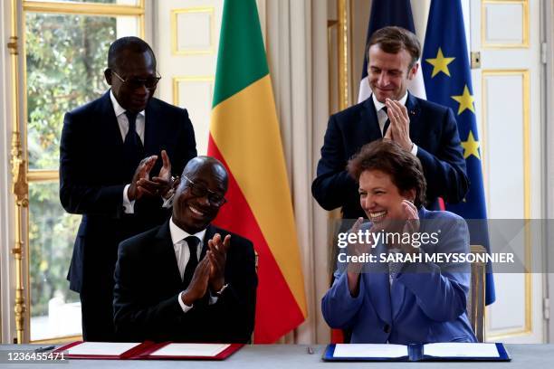 French President Emmanuel Macron , Benin's President Patrice Talon , French Culture Minister Roselyne Bachelot and Benin's Tourism Minister...
