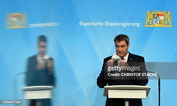 Bavaria's State Prime Minister Markus Soeder addresses journalists during a press conference following the Bavarian cabinet meeting in Munich,...
