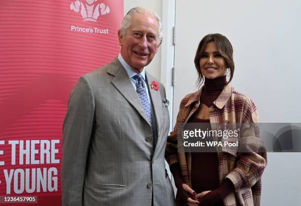 Prince Charles, Prince of Wales and Cheryl Tweedy pose for a photograph with the graduates of the team program during his visit to Cheryl's Trust...