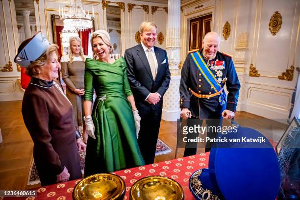 King Willem-Alexander and Queen Maxima of The Netherlands, King Harald, Queen Sonja, Crown Princess Mette-Marit and Princess Martha Louise exchange...