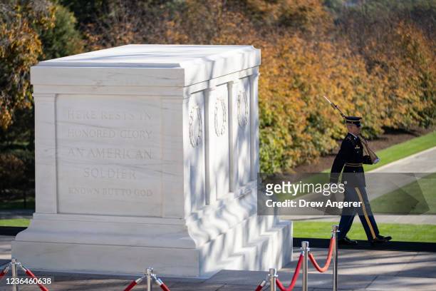 Member of the U.S. Army's Old Guard walks during a centennial commemoration event at the Tomb of the Unknown Soldier at Arlington National Cemetery...