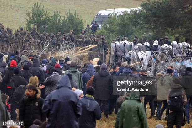 Irregular migrants continue to wait at the Polish-Belarusian border on November 09, 2021 in Belarus. Thousands of irregular migrants are facing...