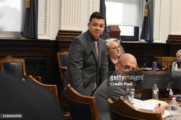 Kyle Rittenhouse and defense attorney Natalie Wisco and Corey Chirafisi after a break during the Kyle Rittenhouse trial at the Kenosha County...