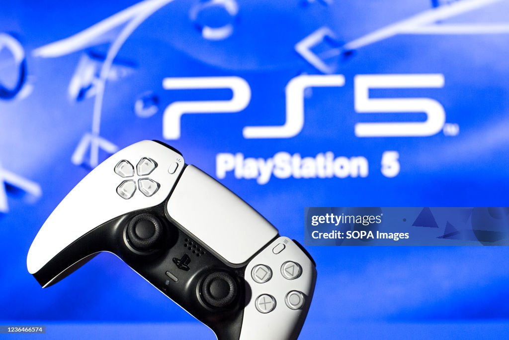 In this photo illustration, a PlayStation 5 controller seen...