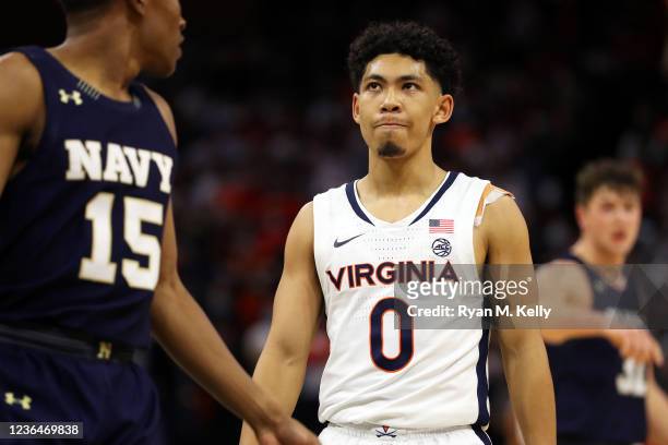 Kihei Clark of the Virginia Cavaliers reacts to a play in the second half during a game against the Navy Midshipmen at John Paul Jones Arena on...