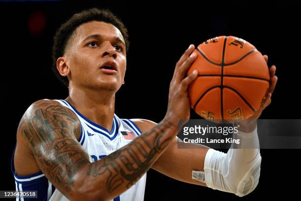 Paolo Banchero of the Duke Blue Devils concentrates at the free throw line against the Kentucky Wildcats in the second half of the State Farm...