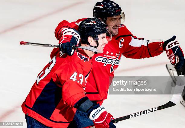 Washington Capitals Left Wing Alex Ovechkin and Right Wing Tom Wilson after a goal by Wilson during an NHL game between the Washington Capitals and...