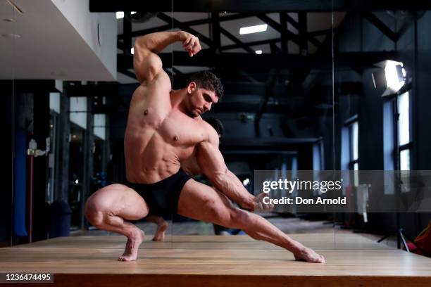 Chris Kavvalos practices posing manoeuvres during a workout at City Gym on May 24, 2020 in Sydney, Australia. IFBB body builder Chris Kavvalos has...